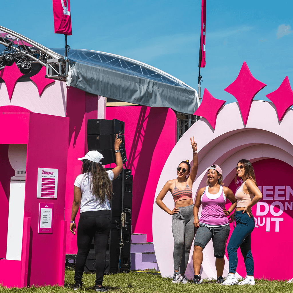 Guests enjoying an experiential photo booth experience at a brand activation event