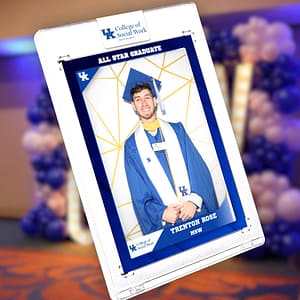 A digital rendering of a floating graduation trading card